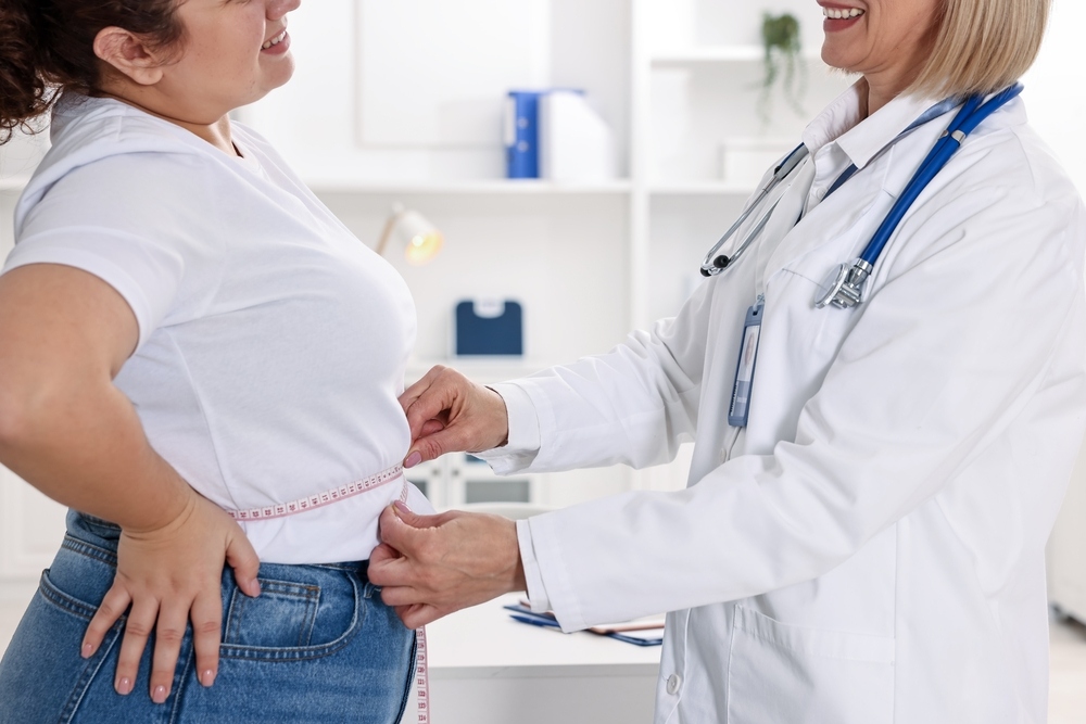 Person checking blood sugar levels while on a medical weight loss for diabetes program