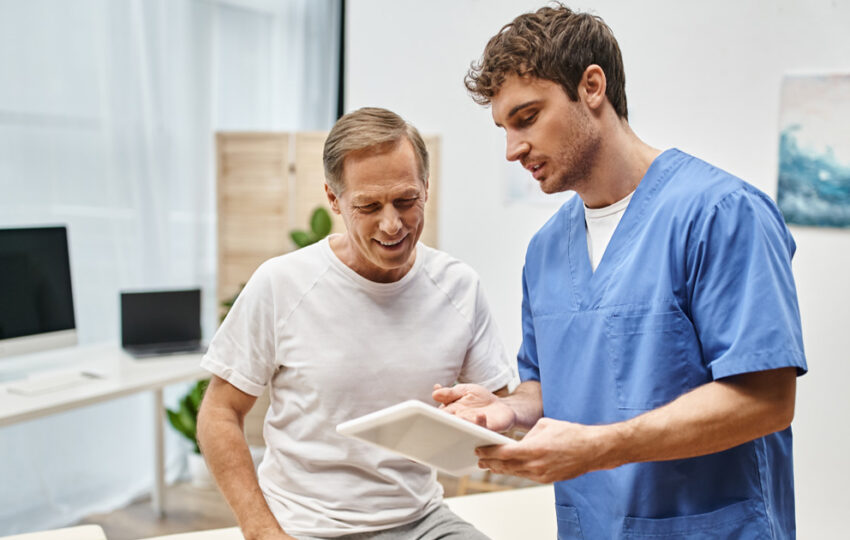 Man discussing TRT for men during testosterone therapy consultation