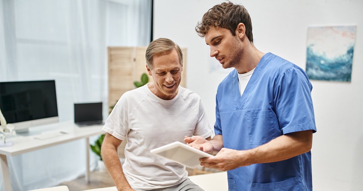 Man discussing TRT for men during testosterone therapy consultation