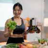 Woman eating healthy vegetables wondering why hormonal imbalance weight gain happens despite a good diet