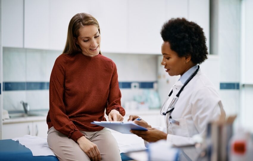 Healthcare provider reviewing lab tests for weight loss results with a patient